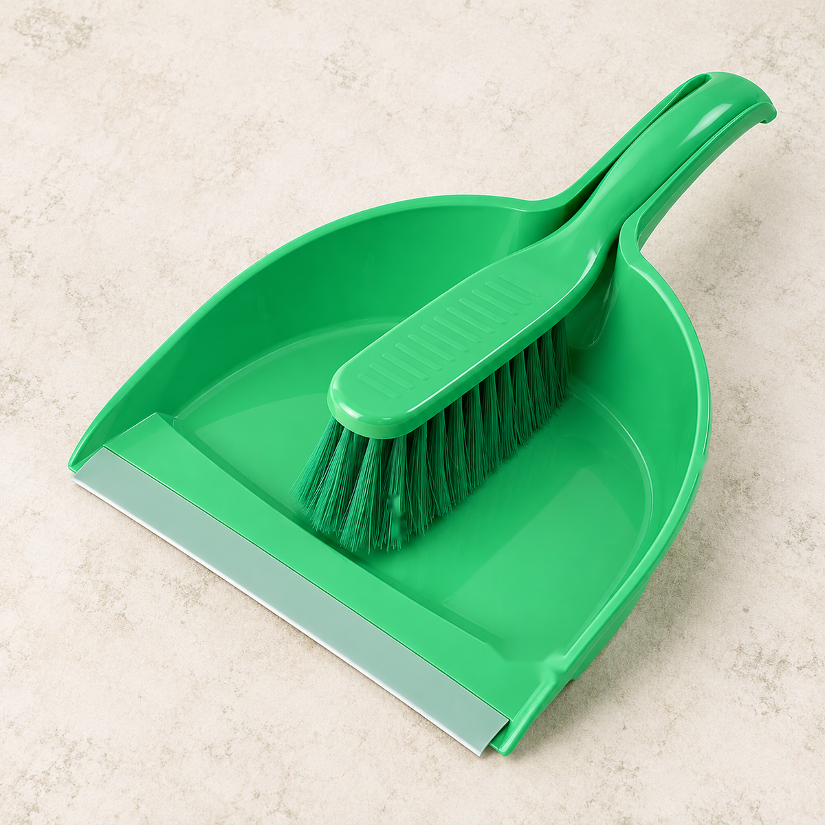 Green dustpan with matching brush