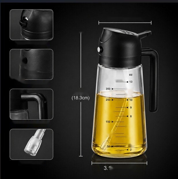 Glass oil sprayer and pourer on a dark background